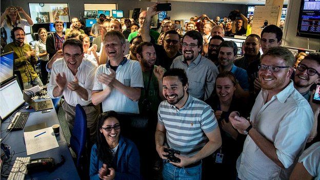 "scientists at cern celebrate the discovery of pentaquark particles"