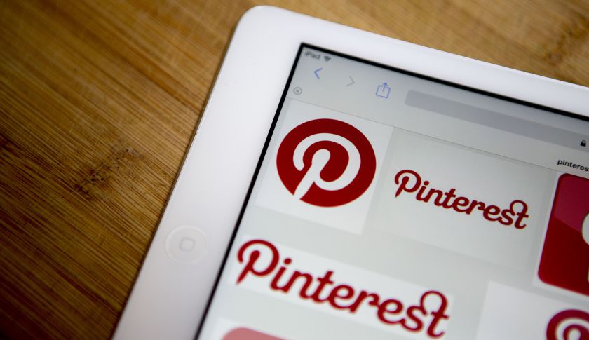 alt="Pinterest Inc. logos are displayed for a photograph on an Apple Inc. iPad Air in Washington, D.C., U.S., on Thursday, Feb. 19, 2015. Pinterest Inc. the online scrapbooking company, is seeking to raise funding at a valuation of about $11 billion, according to a person familiar with the matter, continuing the soaring values of a group of high-profile technology startups"