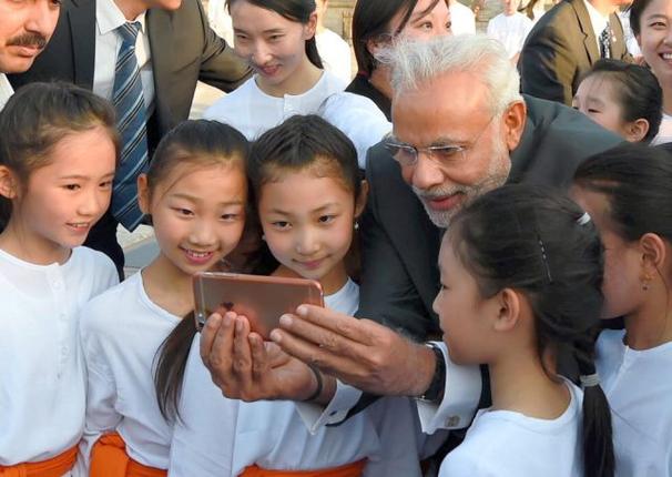 alt="Narendra Modi Selfie with Daughter"