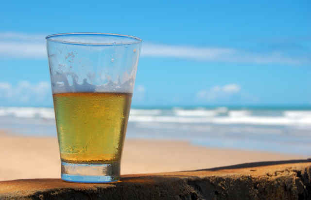 Chilled Glass of Beer by the Beach