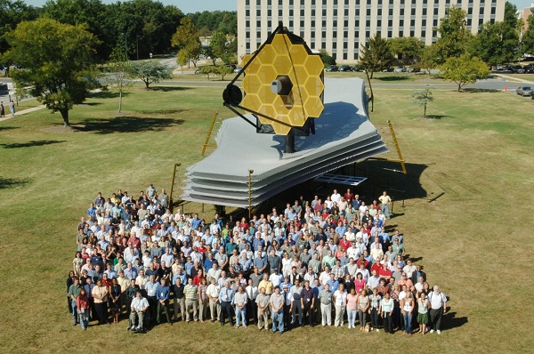 James Webb space telescope surrounded by people