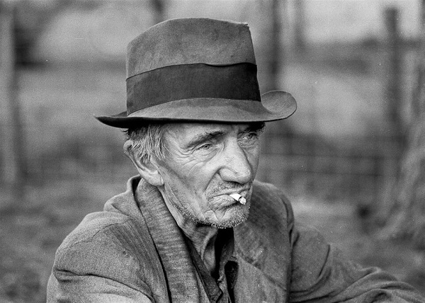 Old man smoking a cigarette