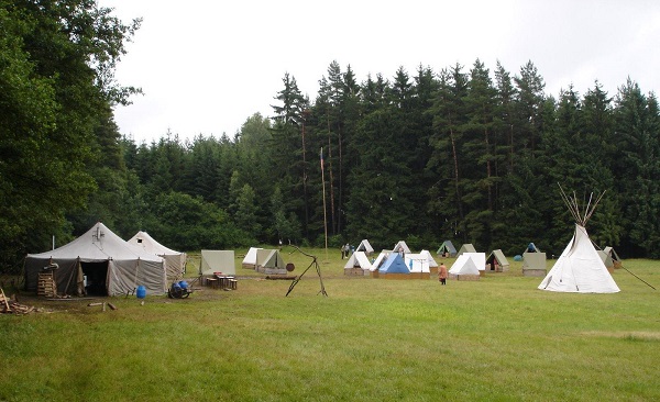 Tents at a scout summer camp in the forest
