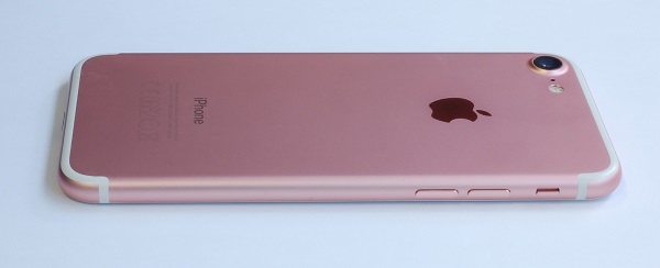 Rose Gold iPhone 7 placed upside down on a table