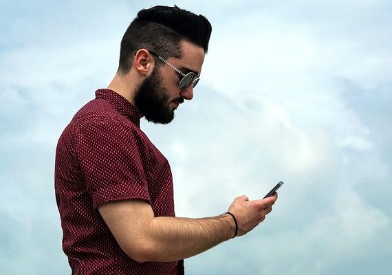 Stressed-out hipster texting