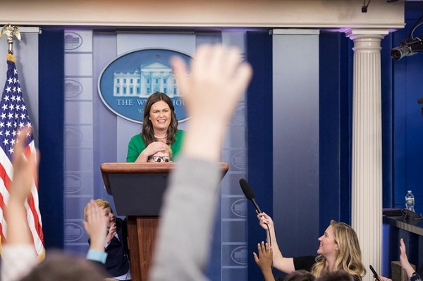 White House Press Secretary Sarah Huckabee Sanders and reporters